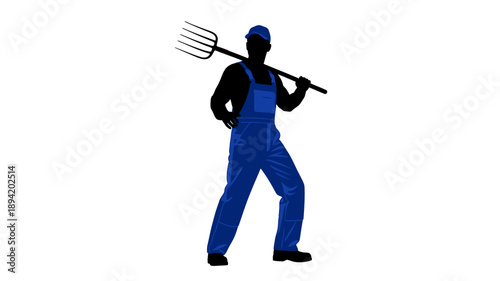 Silhouette of a farmer carrying a pitchfork over his shoulder