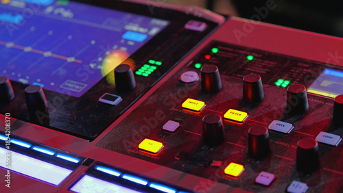Cuadro en lienzo Close-up of a professional sound mixing board in a dark studio