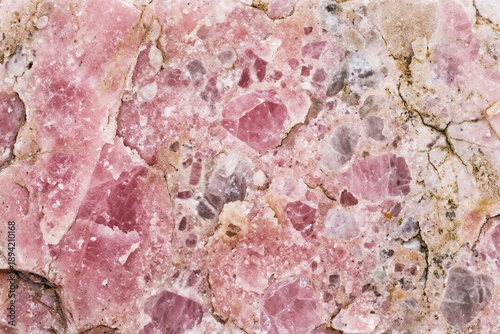 Pink Quartz Texture Background. Rose Rock Crystal Surface. Raw Unpolished Mineral