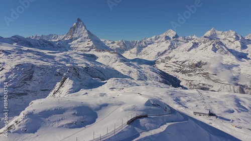 Matterhorn in Motion: Aerial Winter Escape, Gornergrat Tracks to the Summit of Beauty