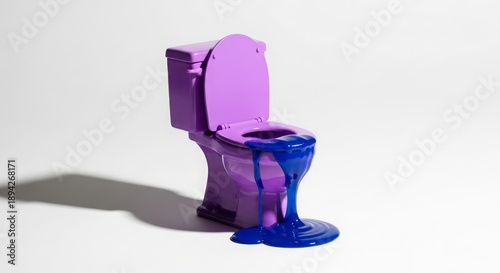 Colorful toilet with blue liquid spilling on white background  
