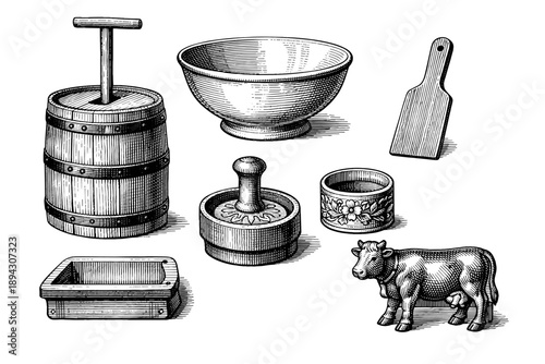 Vintage dairy tools and utensils including butter churn and cow figurine