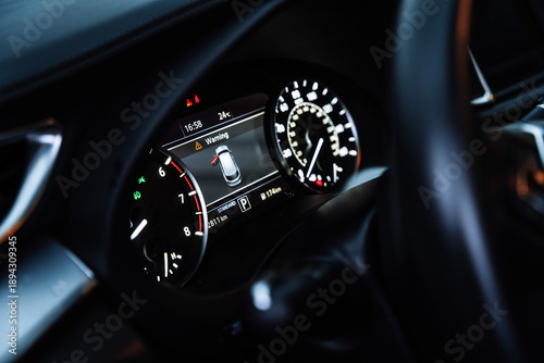 Modern Car Dashboard with Digital Instrument Cluster at Night