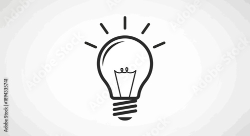 Illuminated Light Bulb Icon Representing Idea and Innovation.