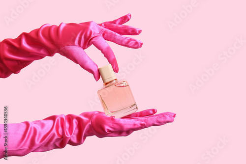 Female hands in pink gloves...