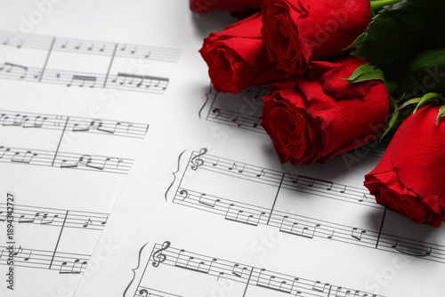Rose flowers on music sheet...