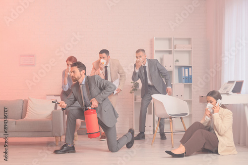 Business man with fire exti...