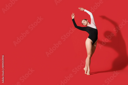 Young ballerina dancing on ...