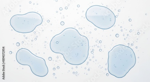Watery puddles, droplets scattered on a white surface