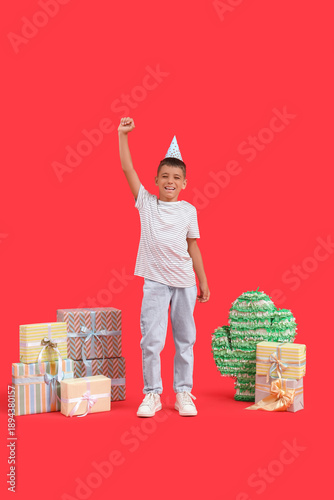Cute little boy in party ha...
