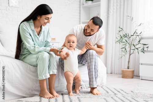 Happy young family with the...