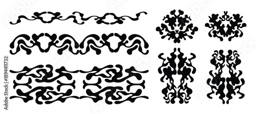 Abstract ink blot inspired symmetrical designs. Black color isolated on white background for various graphic projects.