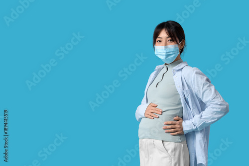 Pregnant Asian woman in med...