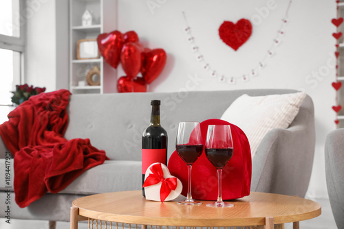 Wine and heart-shaped gift ...