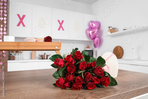 Bouquet of roses and gift b...