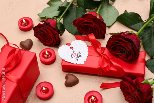 Gift boxes with candles, ro...