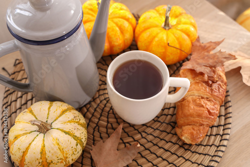 Teapot with cup of hot beve...