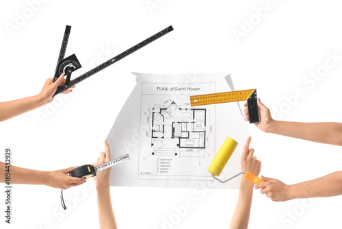 Women with architect's supplies and house plan on white background