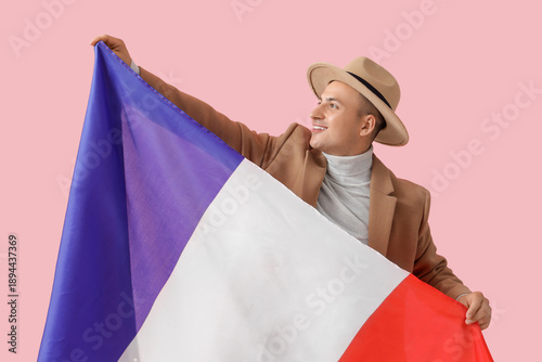 Young man with flag of Fran...