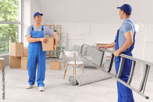 Loaders carrying cardboard ...