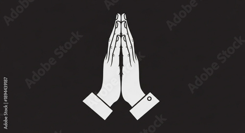 Praying hands in white on black background symbolizing faith and spirituality