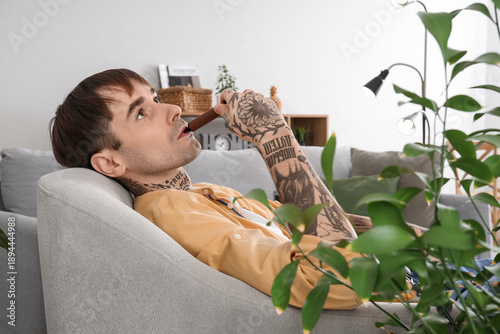 Young handsome man smoking ...