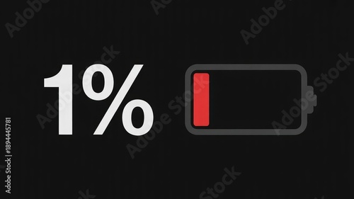 Digital display showing critical one percent battery life remaining alongside a low power icon indicating urgent need for charging a mobile device