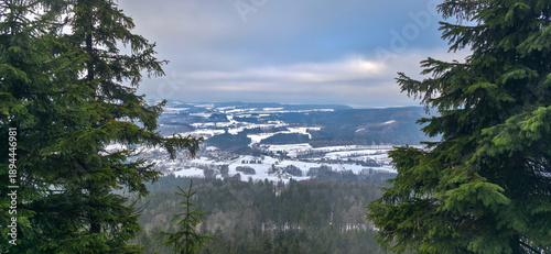 Photos View of valleys and villages from mountain trail in the Sudeten Mountains in win