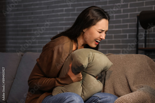 Depressed young woman with ...