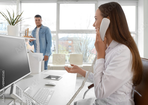 Female receptionist talking...