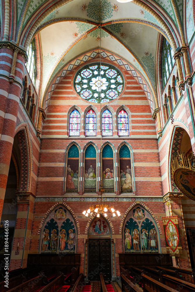 Fototapeta premium Magnificent rose window and neo-Gothic frescoes in Sint-Jacobus de Meerdere church in The Hague (Den Haag), South Holland, The Netherlands