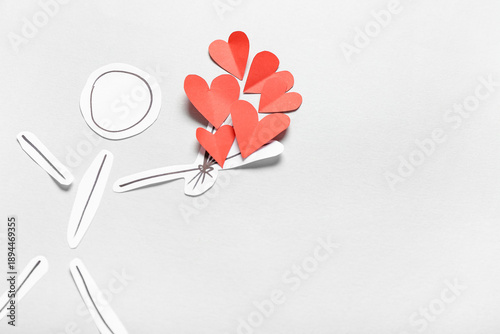 Paper human figure with hea...