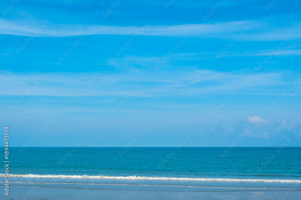 Obraz premium Nature clear sky and summer sea water for summer vacation concept.with sunlight of beautiful clouds blue sky with white altocumulus clouds.with 