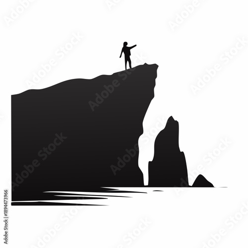 Silhouette of a person standing on a cliff edge with ocean view concept adventure