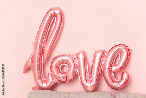Balloon in shape of word LO...