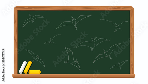 Green chalkboard with chalk drawings of flying pterodactyls and chalk pieces on the tray, illustrating ancient creatures.