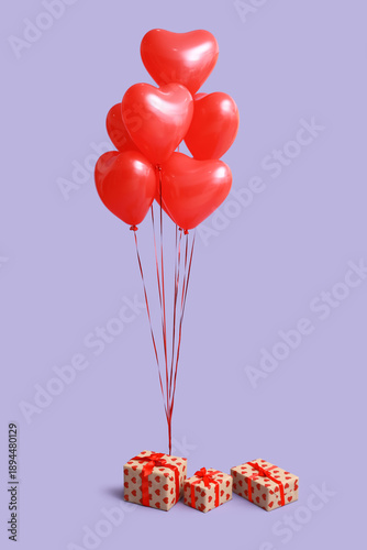 Red heart-shaped balloons a...