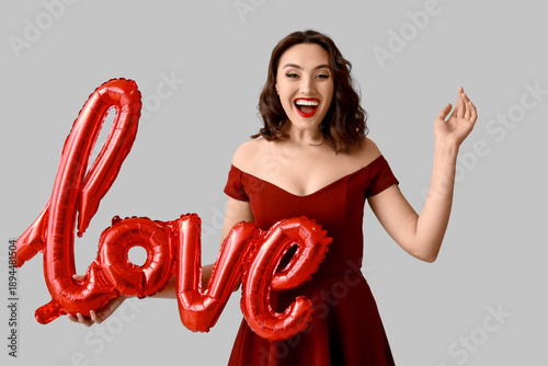 Happy young woman with air ...