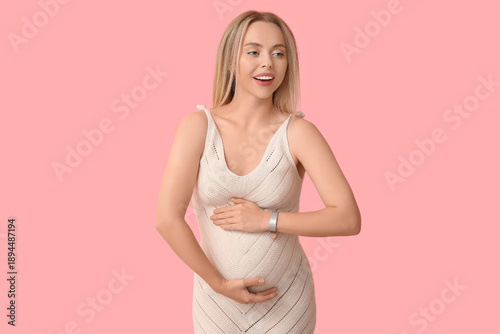Happy pregnant woman on pin...