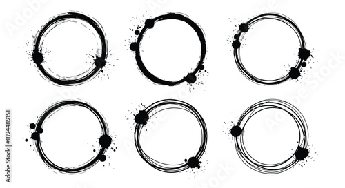 Set of six black ink splatter circles on white background