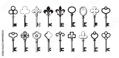 Decorative antique keys set with ornamental handles for vintage decor and secret hidden door theme