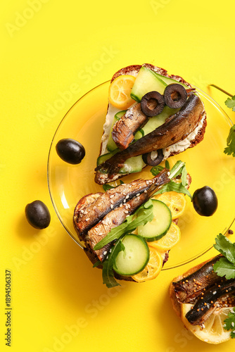 Plate of tasty sandwiches w...
