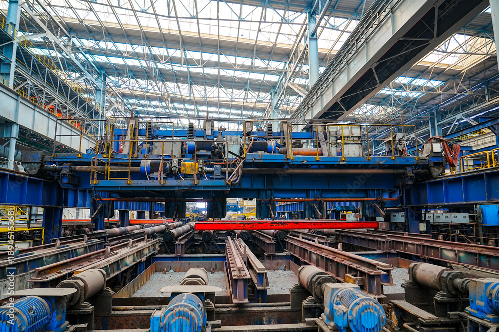 Fototapeta premium The fiery steel billet, the core moment of the rolling mill production line