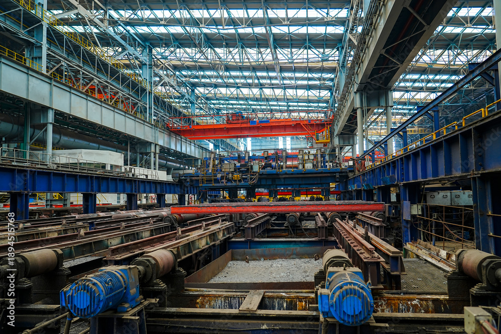 Fototapeta premium The fiery steel billet, the core moment of the rolling mill production line