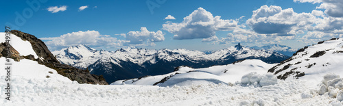 Valokuva Panoramic view of snow‑covered mountains with Black Tusk rising in the distance