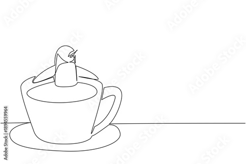 Single line drawing of penguin shows cute animal soaking in coffee cup for nature concept. Unique design features arctic bird for an international cafe day theme in minimalist and kids coloring book