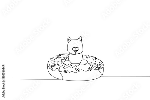 Single line drawing of adored playful cat for health concept shows cute animal lying inside sprinkled donut. Simple sketch fits international food day theme with favorite domestic mammal pet creature