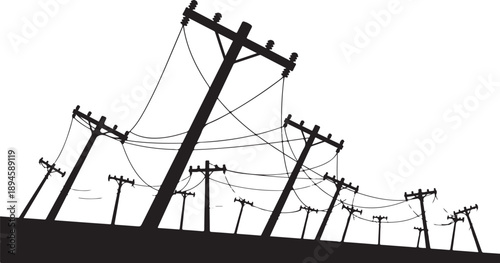 Electric power lines and utility poles in silhouette landscape