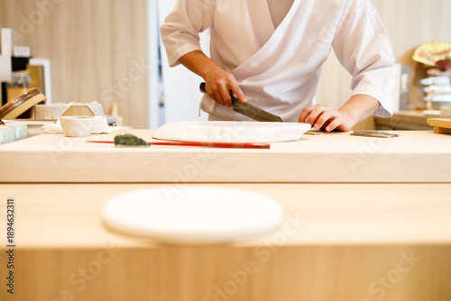Japanese sushi restaurant with sushi chef background.