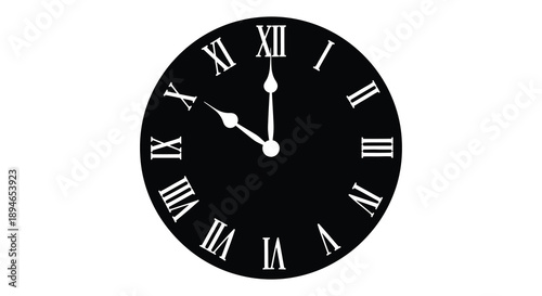 A striking black clock face displays roman numerals and hands pointing to ten past two a bold silhouette